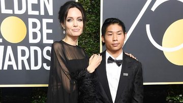 Angelina Jolie leva o filho Pax no Globo de Ouro - Getty Images